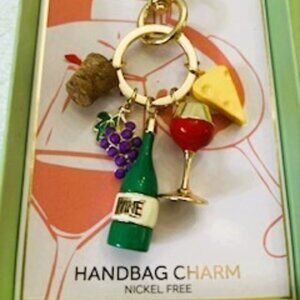 true-to-form brand handbag charm with wine, cheese and cork NWT
